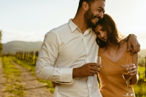 couple in vineyard happy with their medicare