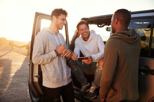 guys talking by car about medicare