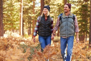 couple on a hike in the fall with Medicare Part C